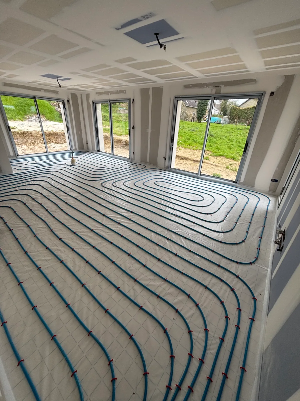 Plancher chauffant avec collecteur inox et tuyaux Thermacome
